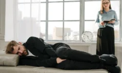 Mens mental health, a man lying down upset