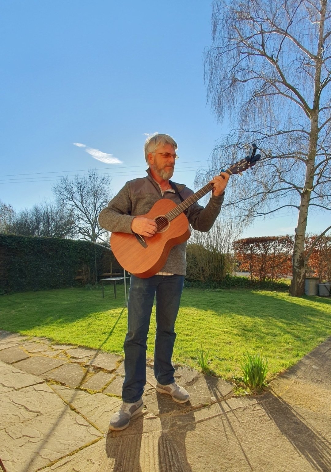 Stuart playing guitar